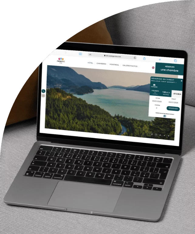 Preview of a hotel website generated from Reservit, shown on a computer and on a phone