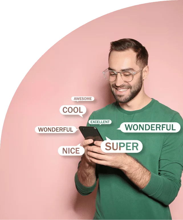 A smiling traveller writes a review on his phone, surrounded by words of praise.